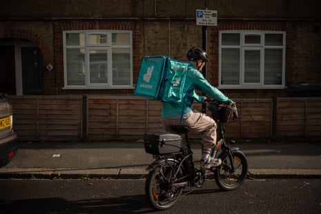 Life of UK Food Delivery Riders: Challenges and Company Responses image from theguardian.com