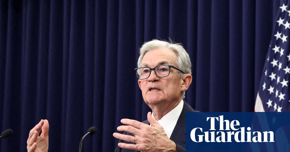 Federal Reserve Cuts Interest Rates Amid Economic Uncertainty image from theguardian.com