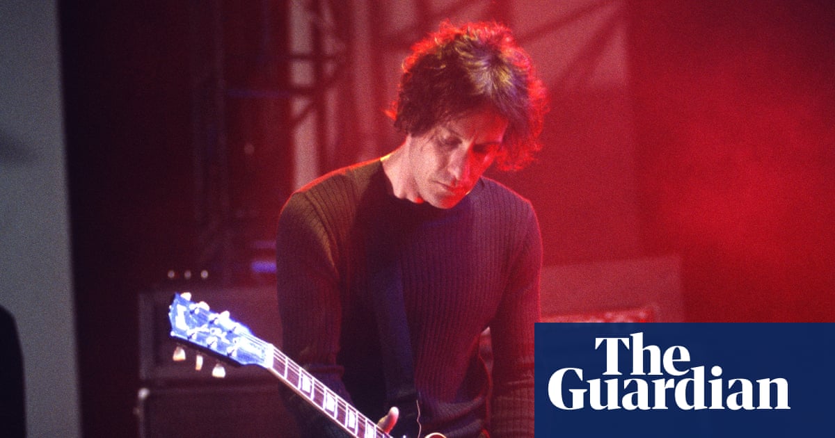 Perry Bamonte, Guitarist for The Cure, Dies at 65 image from theguardian.com
