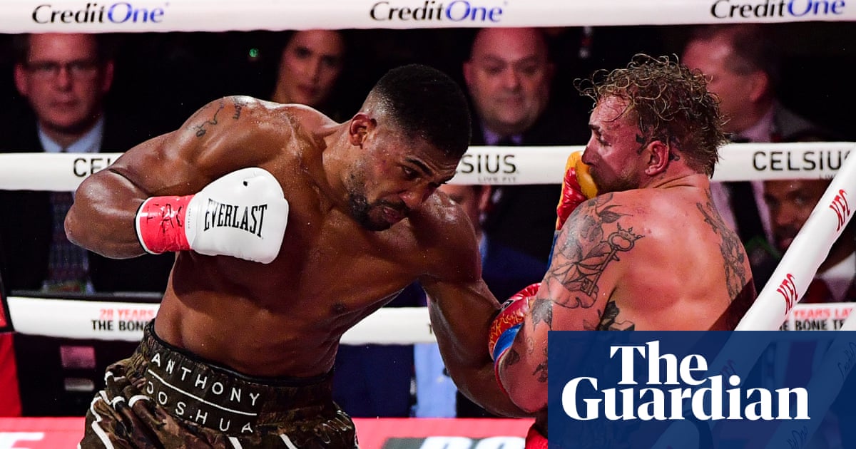 Anthony Joshua Defeats Jake Paul with Fourth Knockdown in Miami image from theguardian.com