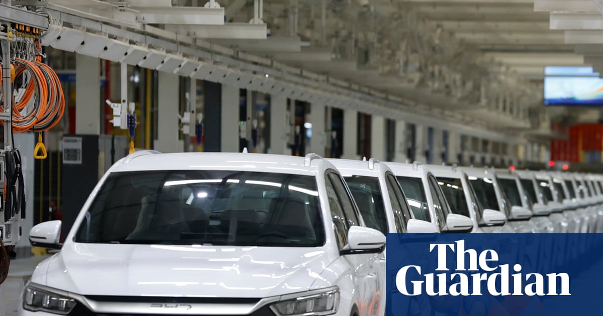 BYD Surpasses Tesla as World's Largest Electric Carmaker in 2025 image from theguardian.com