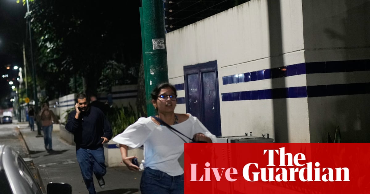 Explosions and Aircraft Reported in Caracas Amid Claims of Attack image from theguardian.com