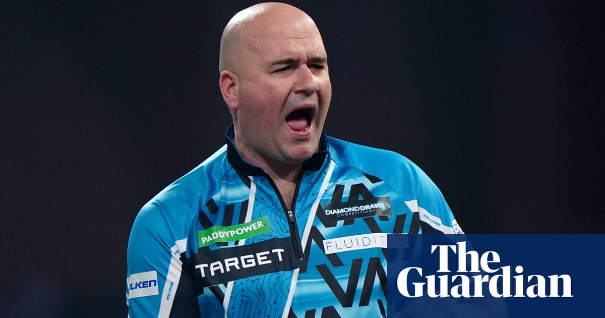 Rob Cross Advances to Third Round at PDC World Darts Championship image from theguardian.com