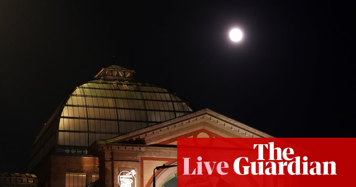 PDC World Championship Darts Semi-Finals Set for High-Stakes Night at Alexandra Palace image from theguardian.com