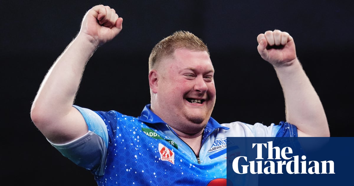 Ricky Evans Upsets James Wade at PDC World Darts Championship Amidst Walk-On Music Changes image from theguardian.com