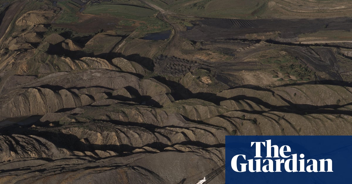 Missing worker found dead after roof collapse at Queensland coalmine image from theguardian.com
