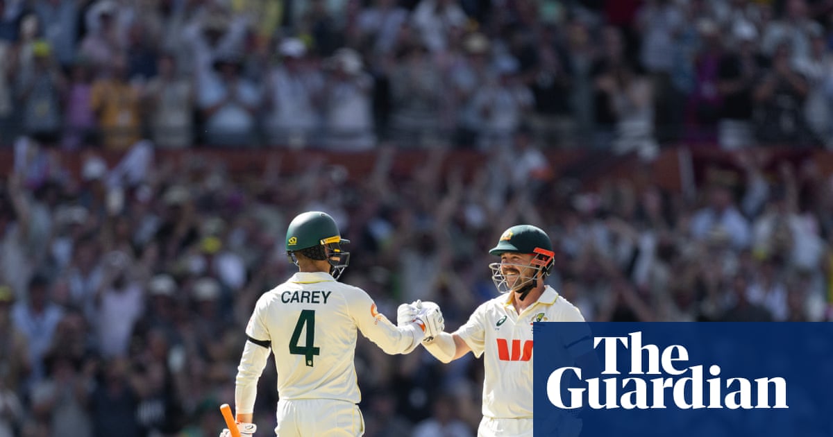 Travis Head’s Fourth Consecutive Century Leads Australia to Commanding Position Against England in Adelaide Test image from theguardian.com
