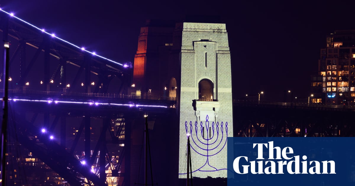 Sydney New Year's Eve Features Sombre Tone with Vigils and Fireworks Following Bondi Beach Terror Attack image from theguardian.com